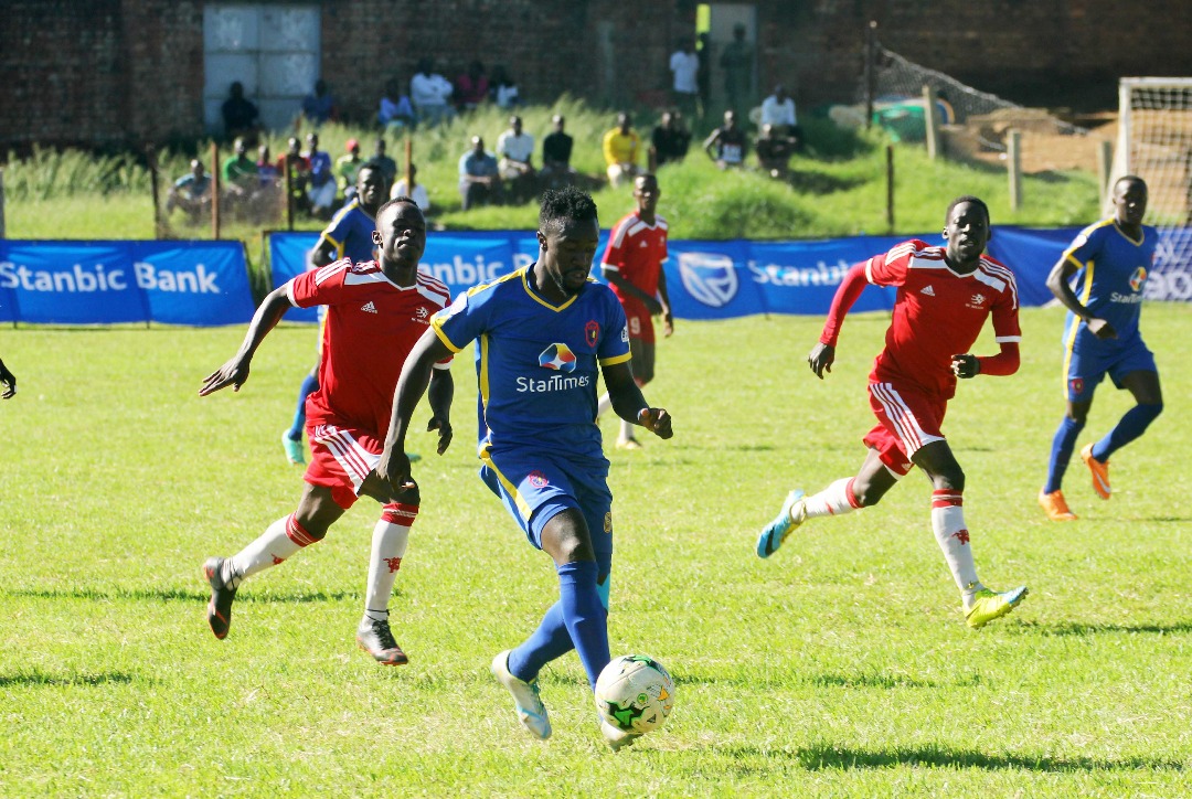 KCCA FC's Ibrahim Sadam Juma in control of the ball at the Recreation grounds in Masaka against Synergy FC