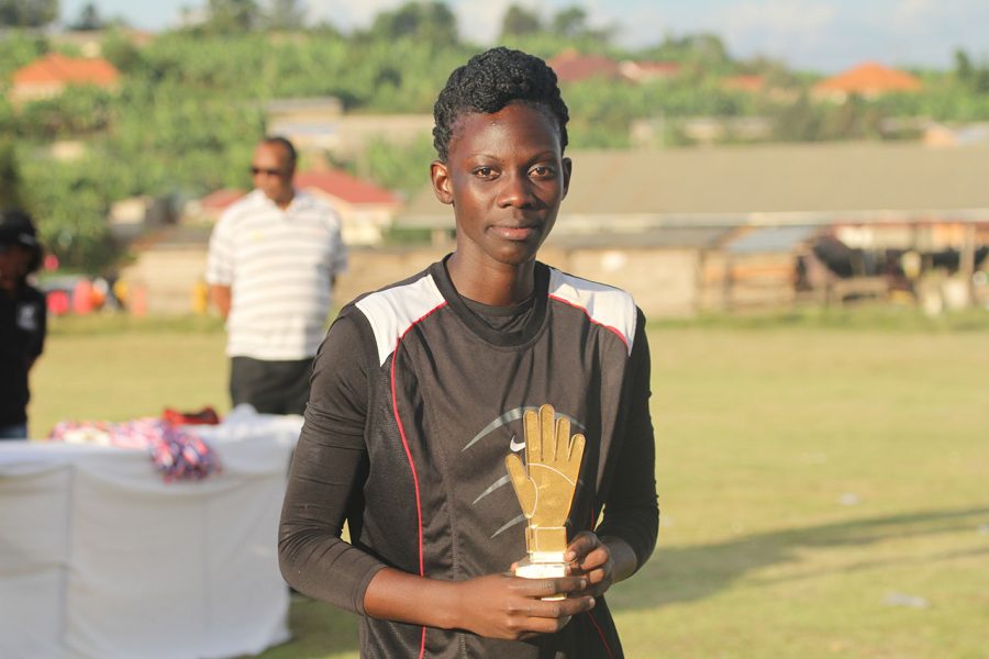 UCU Aturo Ruth posses with her best goalkeeper accolade