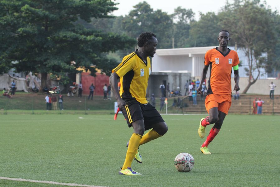 Bugisu Captain Nicholas Wadada takes on Teso Captain Godfrey Akol